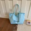 Bolsa de Lona con Estampado de Letras para Viajes Transfronterizos para Mujer 2026 Nueva Moda Gran Capacidad Versátil Ligera Bolso de Hombro