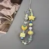 Estilo Dulce Fresco Corazón Lazo Cámara CCD Cuerda de Mano Acrílico Hecho a Mano con Cuentas Cadena para Teléfono Móvil DIY Cadena Colgante para Teléfono Móvil