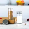 Botella Redonda de Vidrio Transparente de 120 ml para Cocina Casera con Tapa de Bambú Almacenamiento de Sal Pimienta Polvo Juego de Botellas Vacías Venta al por Mayor