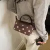 Bolso de mano de lunares para mujer estilo europeo y americano, estilo coreano, lujo de nicho, bolsa tote versátil y elegante para ir al trabajo, bolso de hombro y bolso cruzado