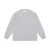 Camiseta de Manga Longa Masculina 2026 Outono Nova Gola Redonda Solta Casual Bolso Cor Sólida Camiseta Versátil Tendência Algodão
