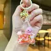 Llavero creativo de pentagrama con animales marinos rellenos de aceite, lindo colgante de figura de tiburón y ballena de dibujos animados, accesorio para bolso