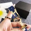 Elegante Reloj de Mujer Dorado con Diamantes y Esfera Azul, Correa de Caucho Azul, Bisel Totalmente Incrustado de Diamantes, Estilo para el Trabajo, Exquisito Lujo Ligero, Reloj Decorativo de Gama Alta