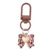 Llaveros KT de leopardo en tonos marrones, color café, accesorios para manualidades al por mayor, llaveros de cuentas lindos y elegantes, dijes para bolsas