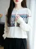 Estilo transfronterizo top 2025 jacquard tejido fino cuello redondo retro étnico otoño e invierno cárdigan de punto suéter versátil para mujer abrigo