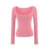 Ropa de mujer al por mayor transfronteriza 2026 otoño nueva sexy chica caliente cuello en U grande bolsillo de parche overlock manga larga camisa base