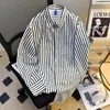 Camisa listrada para homens, de manga comprida, solta, casual, estampada, top novo estilo para primavera e outono, alta qualidade, com bom caimento, sem amassar