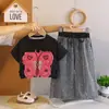 Novo Conjunto de Moda de Manga Curta de Verão para Crianças Pequenas: Conjunto de Duas Peças Elegante e Versátil com Top de Manga Curta e Laço para Meninas