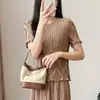 Falda plisada estilo Miyake para mujer, jacquard con cuentas de verano, elegante y estilosa, de cintura alta, bajo amplio, falda midi de línea A