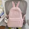 Nova mochila estilo japonês ins de alta aparência, fresca e doce, cor de doce, com laço, para alunos do ensino fundamental II e médio, bolsa leve de duas alças