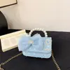 Nueva bolsa para niños bolsa de niña cadena de perlas bolso de mano moda estilo extranjero princesa hombro bandolera monedero