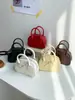 Bolso bandolera pequeño ligero hecho a medida para mujer, bolso de mano de moda de alta gama, mini bolso lindo con lazo