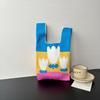 Bolsa Tricotada com Senso Avançado Nova Bolsa de Pulso de Desenho Animado Bolsa de Férias Bolsa de Mão Nicho Versátil Bolsa de Mão Bolsa de Presente
