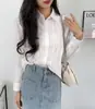 Camisa blanca de punto acanalado con diseño calado de manga larga estilo francés ins para la primavera, nueva blusa blanca con diseño fresco y dulce