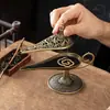 Lámpara Mágica de Aladdín Quemador de Incienso Pequeña Nube Auspiciosa Polvo Antiadherente Sándalo Madera de Agarwood Quemador de Aromaterapia Quemador de Incienso de Aleación Adornos Creativos