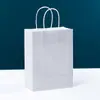 Bolsa de papel kraft para desarrollar logo impreso bolso de compras para ropa para hacer tienda de gafas embalaje para panadería tarjeta blanca bolsa de regalo