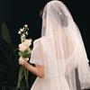 Velo de flor estilo coreano perla brillante corto doble capa multicapa vestido de novia foto de viaje peine de pelo de hada blanco Venta al por mayor