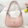 Textura de Moda Francesa 2026 Verano Nuevo Casual Decoración de Moño Estilo Retro para Mujer Bolso de Hombro Único Bajo el Brazo Mujer