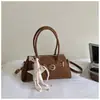 Elegante bolso de mano con estampado de leopardo para mujer, nueva colección 2026, diseño moderno y retro, adecuado para ir al trabajo en otoño e invierno, se puede llevar como bolso de hombro o bolso cruzado