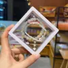 Libro Caperucita Roja Mismo Estilo Estudiante Pulsera de Glaseado de Palomitas de Maíz Hecha a Mano con Cuentas Dibujos Animados Cristal Pulsera Infantil Venta al por Mayor Cajas de Regalo