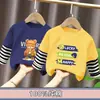 Camiseta de manga larga a rayas de algodón puro para niños, base holgada y versátil, look elegante de dos piezas para niños mayores, top moderno de primavera y otoño