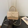 Bolso cuadrado pequeño de lujo ligero estilo coreano transfronterizo para mujer, nuevo bolso de hombro de mariposa invierno 2025, bolso cruzado de alta gama