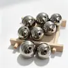 Bolas de acero macizo perforado de acero al carbono, bolas de rodamiento 7 mm 8 mm 9 mm 12 mm, bolas de acero inoxidable con agujero pasante y medio agujero