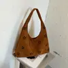 Bolsas de mano para mujer transfronterizas 2026 nuevo otoño, bolsa tote de gran capacidad, bolso de mano y bolso de hombro de nicho de alta calidad para el día a día