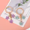 Novo Pingente Chaveiro de Metal Sakura Menina Simples Coração Flor Decoração de Celular Acessórios Pingente de Bolsa Venda por Atacado