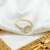 Fornecimento transfronteiriço de anel criativo de ouro 14K com zircônia para mulheres, moda simples, anel de dedo com simulação de diamante, anel de dedo alimentar para mulheres