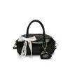 La Bolsa de Bowling Minimalista Dulce de Estilo Trendy de Nicho de Este Año es un Bolso Cruzado Casual y Versátil para Mujer