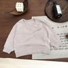 Camiseta Base de Algodón para Niños Primavera 2025 Nuevo Bebé Niña Color Sólido Manga Larga Top Coreano Casual Camiseta de Cuello Redondo