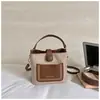 Bolso bandolera retro de nicho estilo coreano para el trabajo y los desplazamientos, que ofrece un ambiente relajado, nueva colección otoño 2026, bolso tipo cubo de alta calidad y moderno