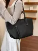 Bolsa de Grande Capacidade para Deslocamento Transfronteiriço Feminina 2026 Nova Bolsa Tote Textura de Alto Padrão Bolsa de Ombro Único Feminina Textura Tecida Bolsa Grande