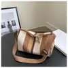 Elegante y práctica bolsa de mano tipo tote de gran capacidad a rayas estilo coreano, nueva colección otoño 2024, adecuada para uso casual y para ir al trabajo