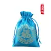 Bolsa de embalaje pequeña de brocado para la suerte al por mayor de fábrica bolsa de tela roja Bolsa de regalo antigua bolsa de la suerte con logo impreso