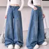 Pantalones vaqueros curvos para niña 2026 nuevo estilo de otoño, pantalones anchos estampados de estrellas para niños medianos y grandes, pantalones largos de retazos, casual
