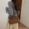 Nuevo modelo Otoño 2026, lujo ligero, elegante, bolso de mano para uso diario, bolso tipo Kelly para mujer de oficina, bolso de hombro