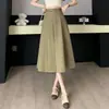 Falda larga para mujer, nuevo estilo otoño 2026, falda de traje de cintura alta con dobladillo amplio, diseño de empalme para ocultar las caderas y crear un efecto adelgazante, falda de longitud media
