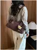 Bolso de gamuza para mujer, nuevo modelo de otoño 2026, bolso tote vintage de alta calidad para el día a día, bolso de hombro de gran capacidad