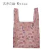 Bolsa cuadrada de tela de flores al por mayor bolsa de compras plegable de tela de poliéster publicidad supermercado almacenamiento portátil bolsa de fresa protección del medio ambiente