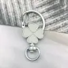 Llavero Pintado Trébol Colorido Accesorio DIY Colgante Resorte Giratorio Abrible Material Ecológico