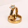 Anillo de Compromiso de Acero Inoxidable Nuevo Europeo y Americano con Diamante Anillo de Pareja Cruzado Rayado en Oro Joyería Personalizada de Moda