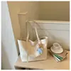 Bolsa tote grande estilo coreano para mulheres, bolsa de ombro versátil e simples, novo modelo 2026, bolsa de mão para trabalho e deslocamento