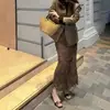 Novo Estilo Saia Cauda de Peixe Retro de Luxo Leve Primavera e Outono 2026 Nova Saia Sexy com Estampa de Leopardo Irregular de Socialite Francesa
