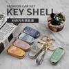 Aplicable a Geely Key Case gl New Emgrand gs Car Key Case S1 Boyue X3 Vision x6 Borui Plantronics Buckle Case