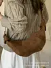 Bolsos de Diseño de Nicho para Mujer Otoño e Invierno 2025 Nueva Moda Bolso de Hombro Único Cruzado Tipo Croissant Bolso de Axila de Alto Nivel Tipo Empanada