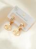 Aretes de acero de titanio de tendencia europea y americana con ojos de luna de flor, multiestilo, personalidad nicho femenina, aretes de acero inoxidable para mujer