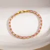 Pulsera transfronteriza personalizada de circonita de colores, estilo de lujo ligero, estilo simple europeo y americano, diseño de nicho, exquisito accesorio para la mano