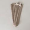 Calcetines altos nuevos para niñas otoño dulce lazo calcetines de tubo Joker calcetines de algodón color sólido calcetines para niños al por mayor